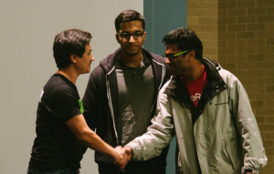 SSL.com CEO Leo Grove (left) congratulates Hussain Mucklai (center)and Revanth Pobala (right), winners of the "Best SSL Spider" challenge at this year's CodeRED hackathon.